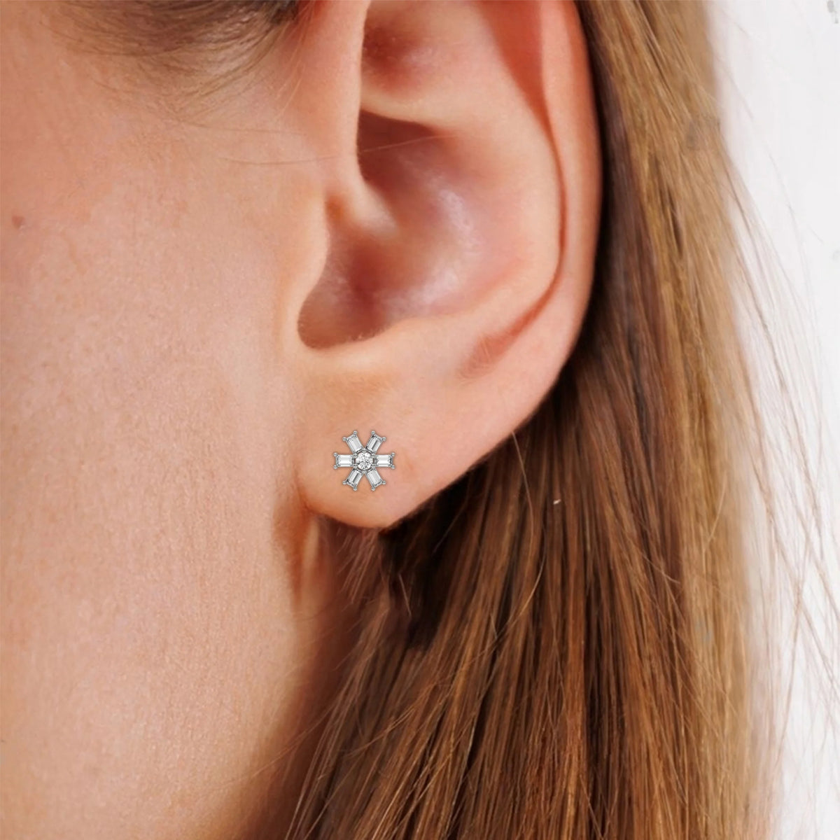 This white gold Flower Diamond Earrings made using baguette and round brilliant-cut diamonds, securely set in prong setting