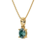 This yellow gold Fancy Green Oval Solitaire Diamond Necklace made with an fancy Green oval cut diamond in a four prong setting with adjustable chain in side view