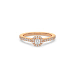 This rose gold ring displayed in front view is made with a cushion solitaire diamond set in four-prong setting