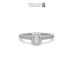 This white gold ring displayed in front view is made with a Emerald solitaire diamond set in four-prong setting