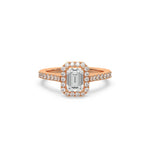 This rose gold ring displayed in front view is made with a Emerald solitaire diamond set in four-prong setting