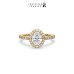 This yellow gold ring displayed in front view is made with a oval solitaire diamond set in four-prong setting