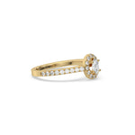 This yellow gold ring displayed in side view is made with a oval solitaire diamond set in four-prong setting