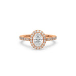 This rose gold ring displayed in front view is made with a oval solitaire diamond set in four-prong setting