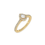 This yellow gold Pear Diamond Halo Engagement Ring is made with a pear solitaire diamond set in a four-prong setting, surrounded by a halo of round diamonds all set on a pave band in 3D view