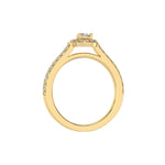 This yellow gold Pear Diamond Halo Engagement Ring is made with a pear solitaire diamond set in a four-prong setting, surrounded by a halo of round diamonds all set on a pave band in through finger view