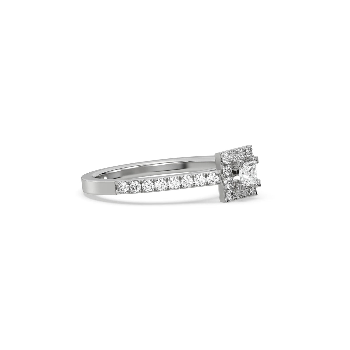 This white gold ring displayed in side view is made with a princess solitaire diamond set in four-prong setting