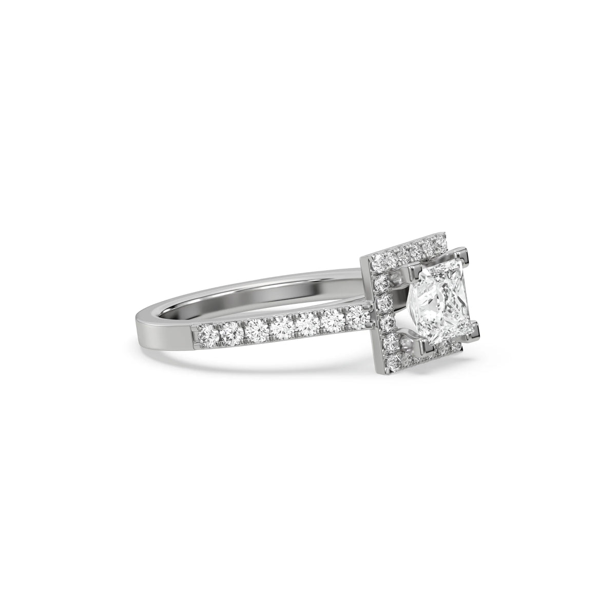 This white gold ring displayed in side view is made with a princess solitaire diamond set in four-prong setting