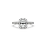 This white gold ring displayed in front view is made with a radiant solitaire diamond set in four-prong setting