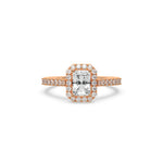 This rose gold ring displayed in front view is made with a radiant solitaire diamond set in four-prong setting