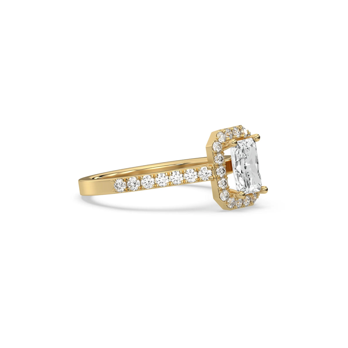 This yellow gold ring displayed in side view is made with a radiant solitaire diamond set in four-prong setting