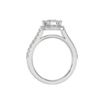 This white gold Round Diamond Halo Engagement Ring is made with a round solitaire diamond set in a four-prong setting, surrounded by a halo of round diamonds all set on a pave band in through finger view