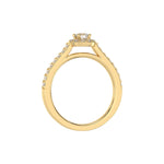 This yellow gold Round Diamond Halo Engagement Ring is made with a round solitaire diamond set in a four-prong setting, surrounded by a halo of round diamonds all set on a pave band in through finger view