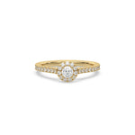 This yellow gold ring displayed in front view is made with a round solitaire diamond set in four-prong setting