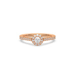 This rose gold ring displayed in front view is made with a round solitaire diamond set in four-prong setting