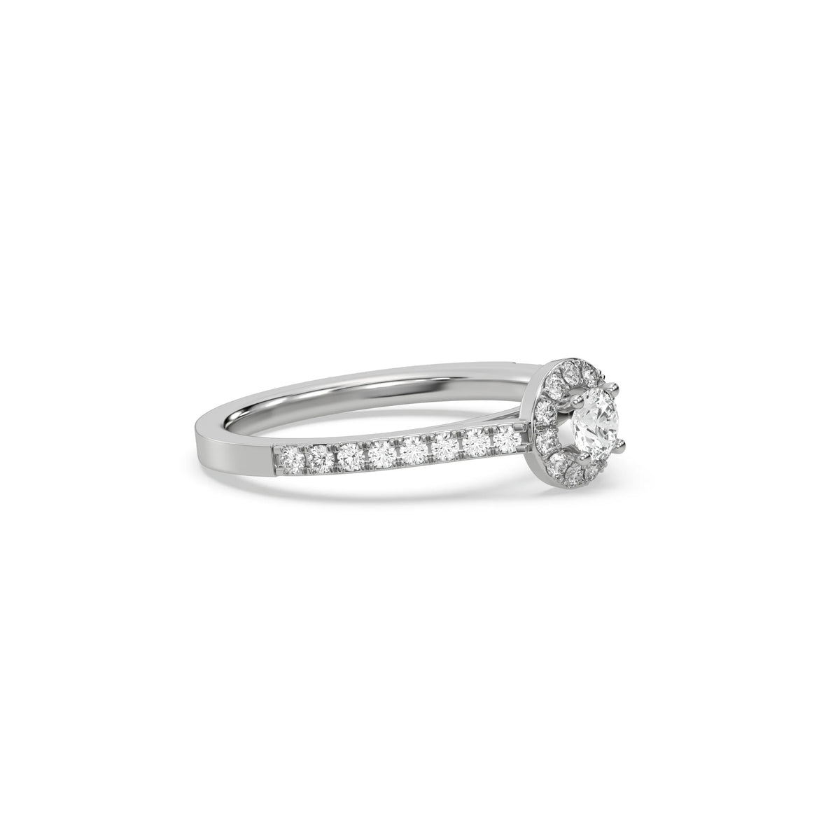 This white gold ring displayed in side view is made with a round solitaire diamond set in four-prong setting