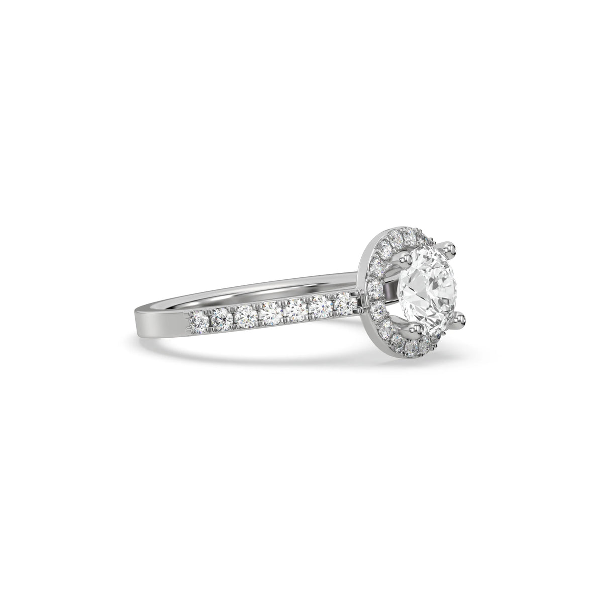 This white gold ring displayed in side view is made with a round solitaire diamond set in four-prong setting