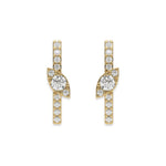 Pair of vertical bar studs in yellow gold featuring a marquise cluster accent and a prong-set round diamond stud earring design with sparkling stones with a white background.