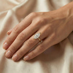 Minimalist yellow gold solitaire engagement ring featuring a striking elongated marquise cut diamond.