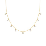 This yellow gold Round Dangling Diamond Necklace made with nine round brilliant-cut diamond set in a prong setting, distributed evenly along the chain in top view