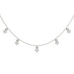 This white gold Round Dangling Diamond Necklace made with nine round brilliant-cut diamond set in a prong setting, distributed evenly along the chain in top view