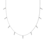 Marquise Dangling Diamond Necklace made with nine marquise cut diamonds each set in a prong setting, distributed evenly along the chain