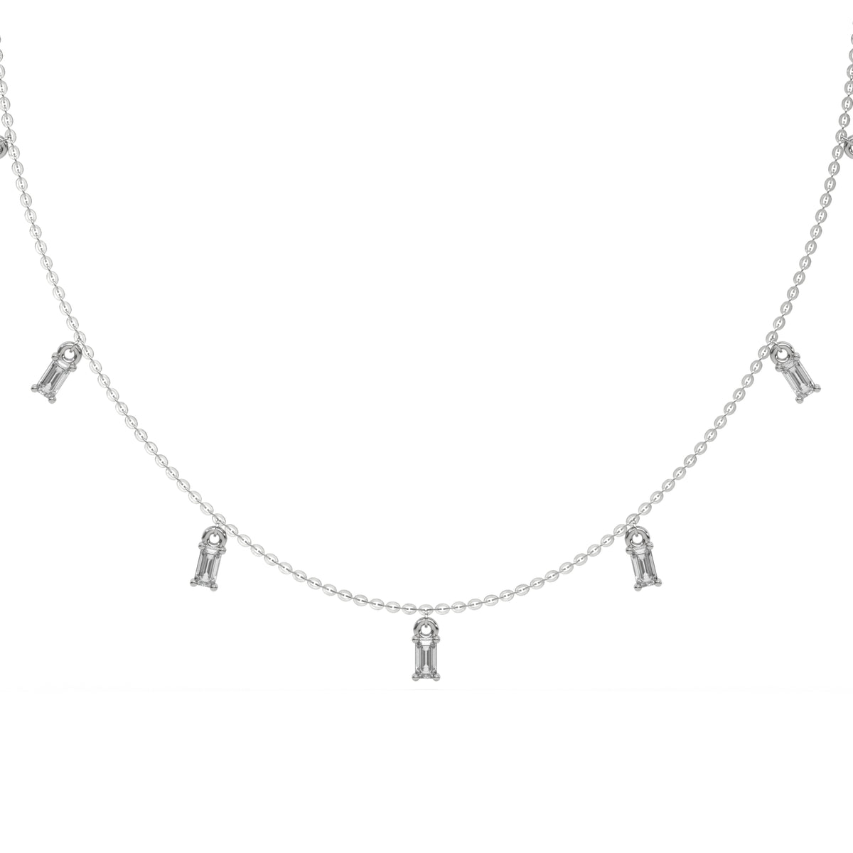 Emerald Dangling Diamond Necklace made with nine emerald cut diamonds each set in a prong setting, distributed evenly along the chain