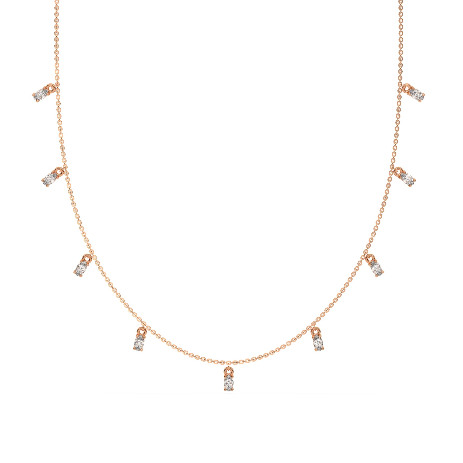 Oval Dangling Diamond Necklace made with nine oval cut diamonds each set in a prong setting, distributed evenly along the chain