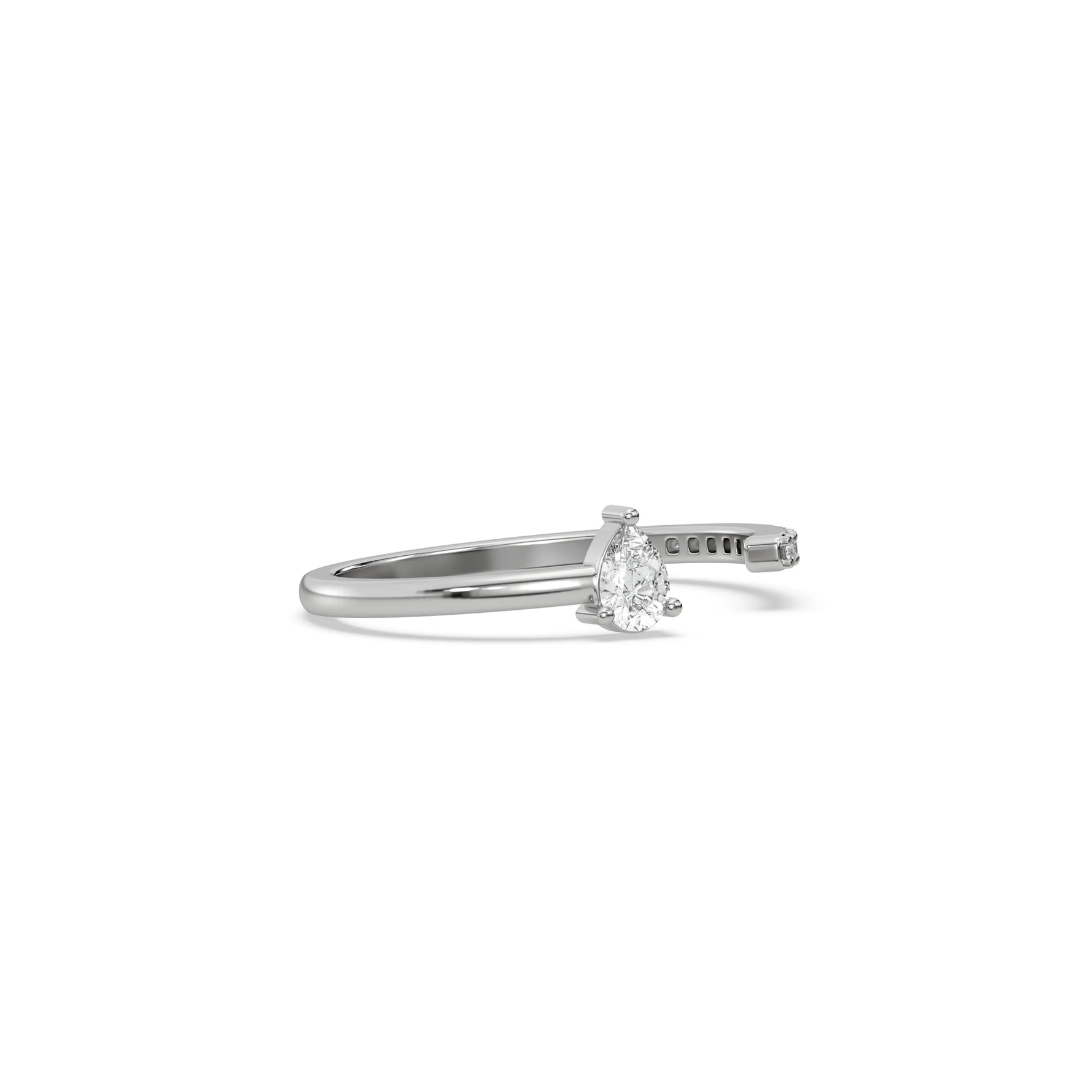 This white gold ring displayed on side view is made with pear diamond and round diamond set in prong setting 