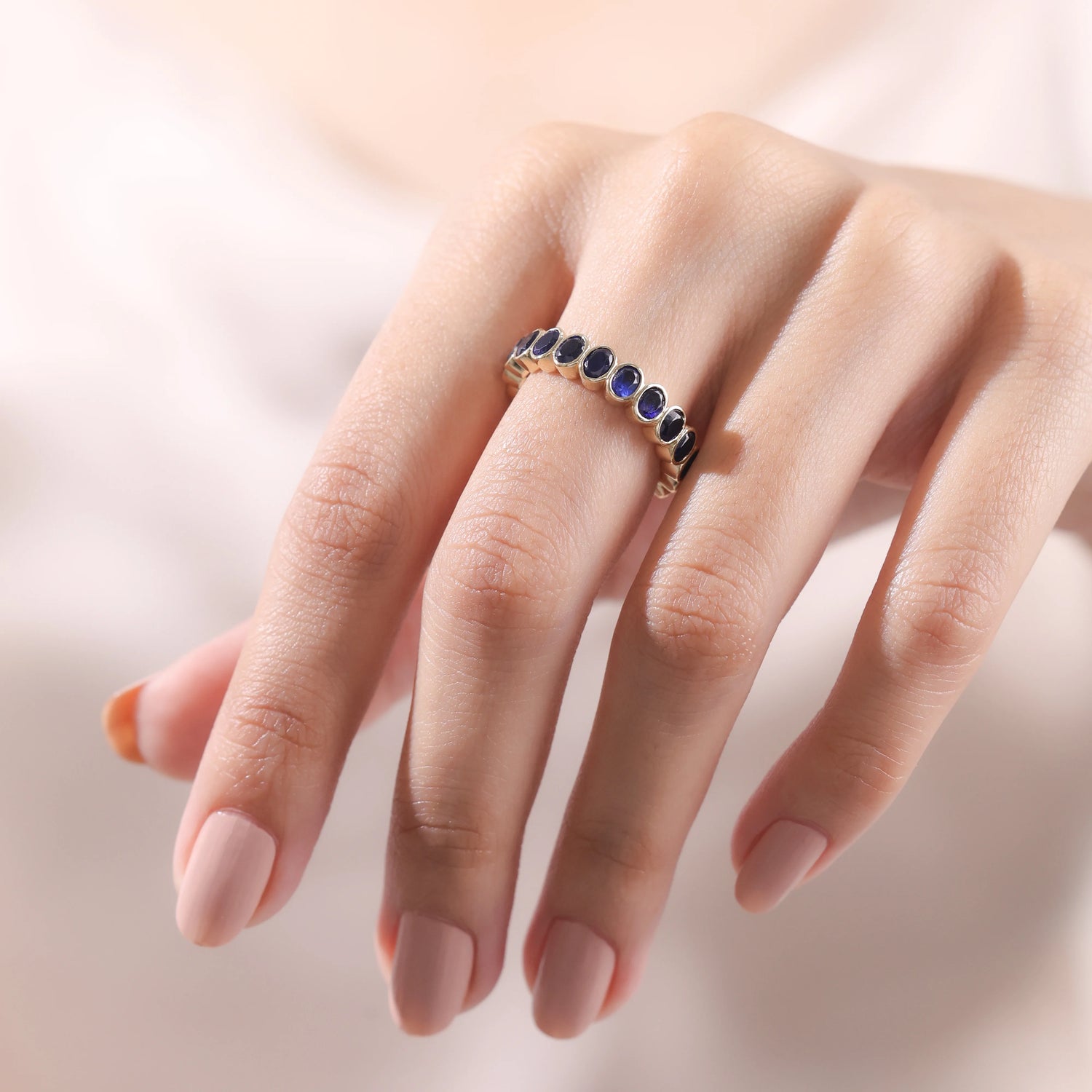 Bezel Set Oval Cut Blue Sapphire Full Eternity Band
