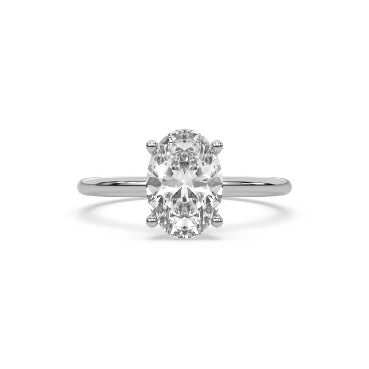 Oval diamond solitaire engagement ring featuring a hidden halo in sterling silver