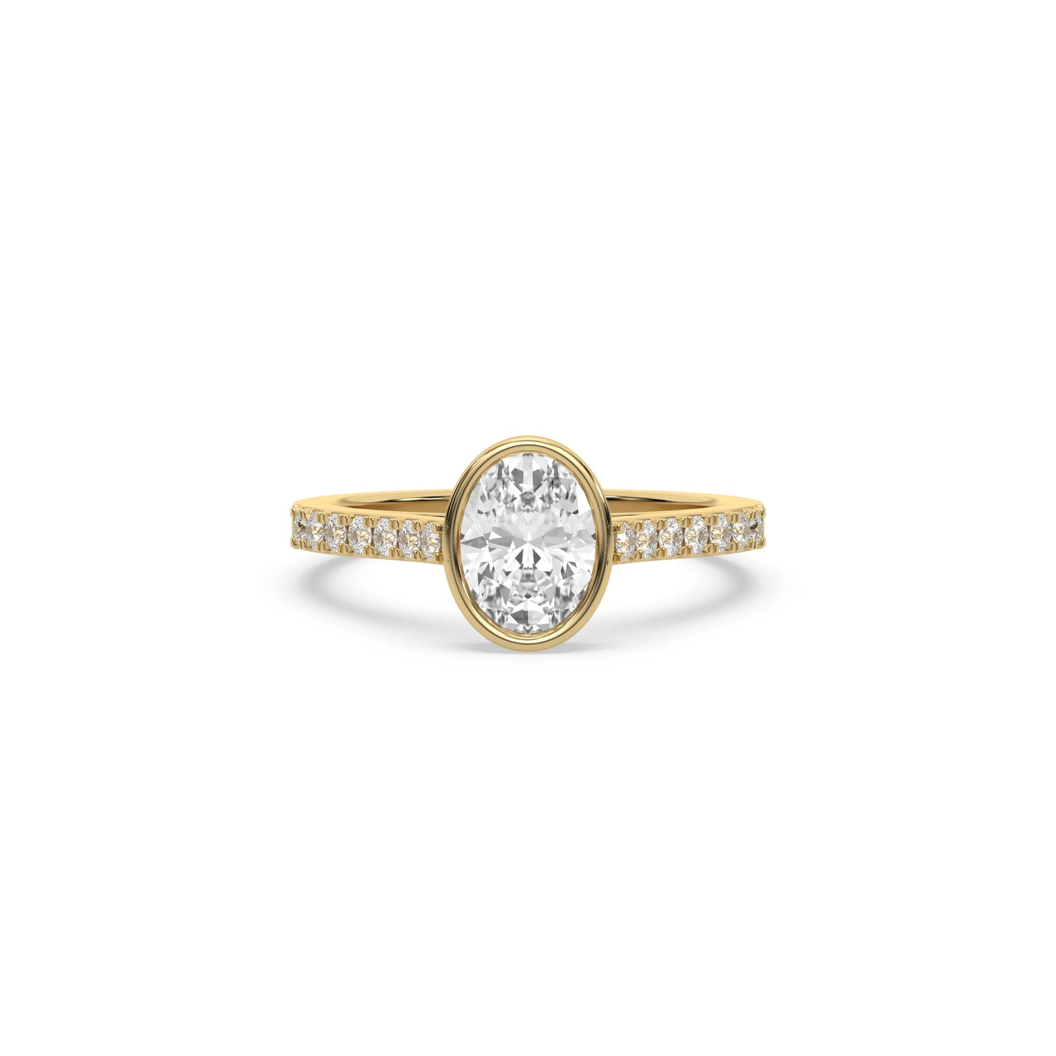 A luxury yellow gold engagement ring featuring a brilliant oval cut diamond secure in a sleek bezel frame with a pave diamond band.