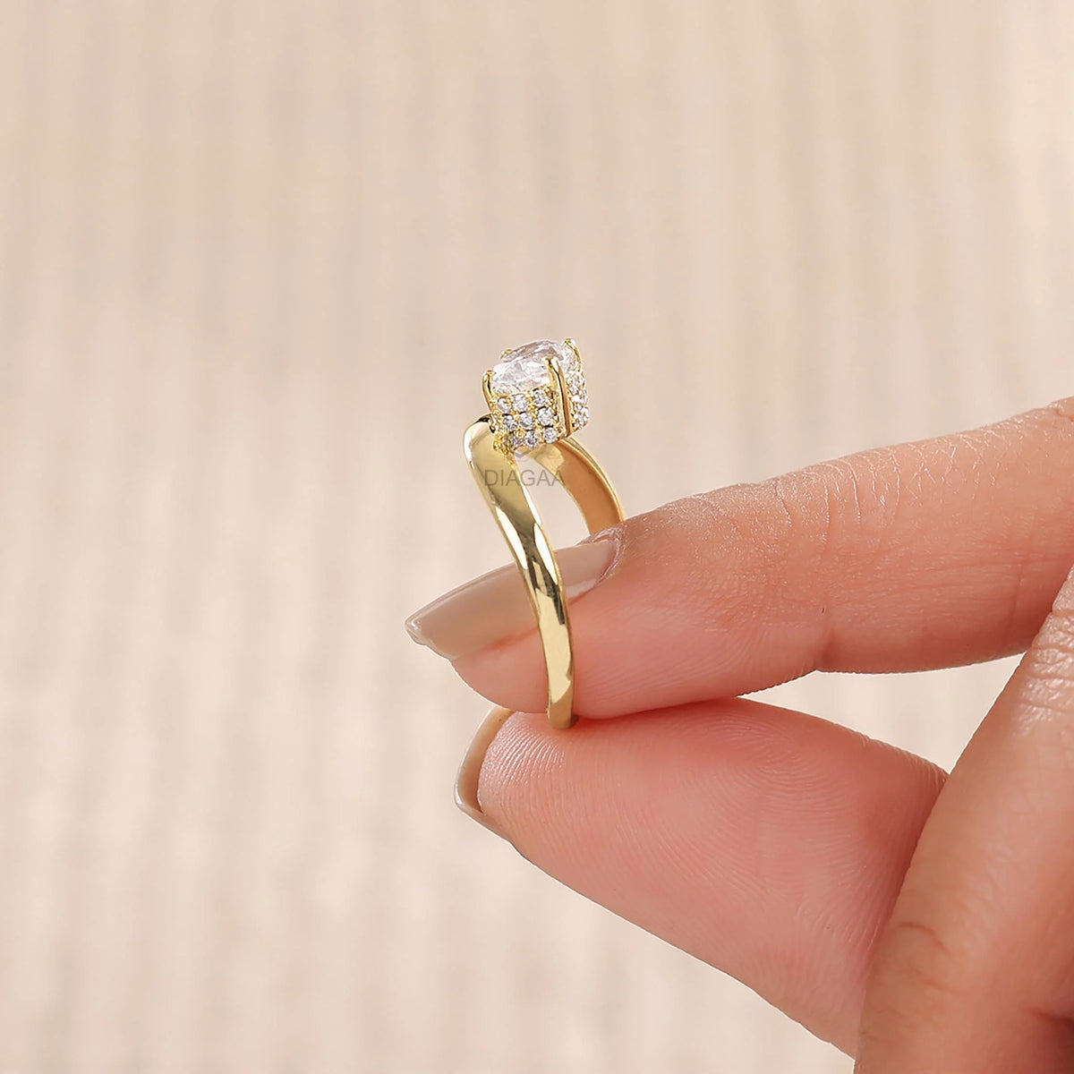 14K yellow gold oval diamond hidden halo solitaire engagement ring with a curved band
