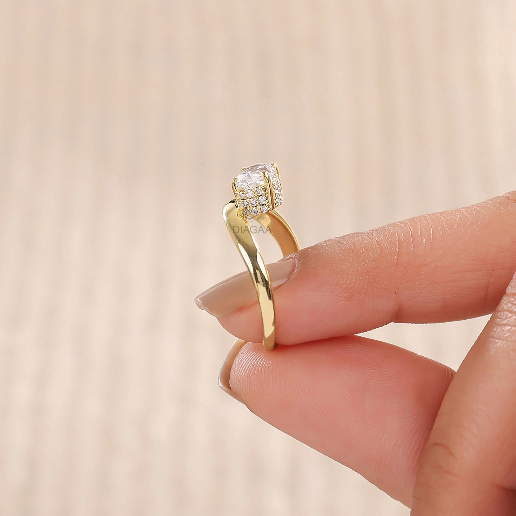 14K yellow gold oval diamond hidden halo solitaire engagement ring with a curved band