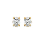 Sparkling oval diamond stud earring set showcasing brilliant-cut stones secured in a yellow gold prong setting.