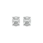 Sparkling oval diamond stud earring set showcasing brilliant-cut stones secured in a white gold prong setting.