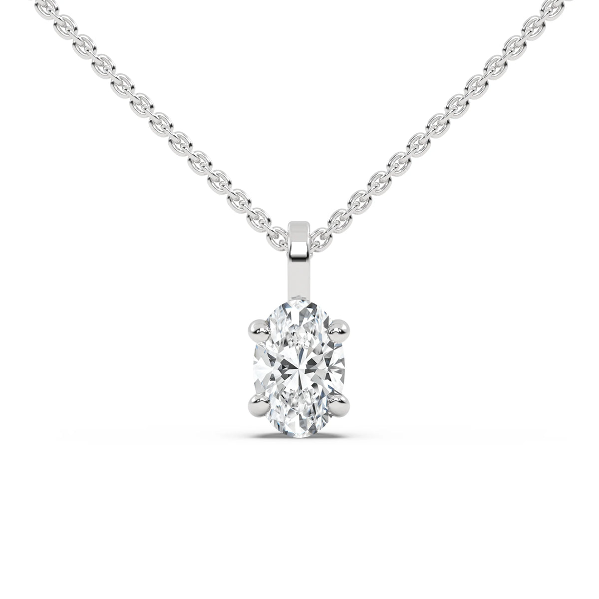 This white gold solitaire necklace featuring an oval diamond securely set in four prongs in top view