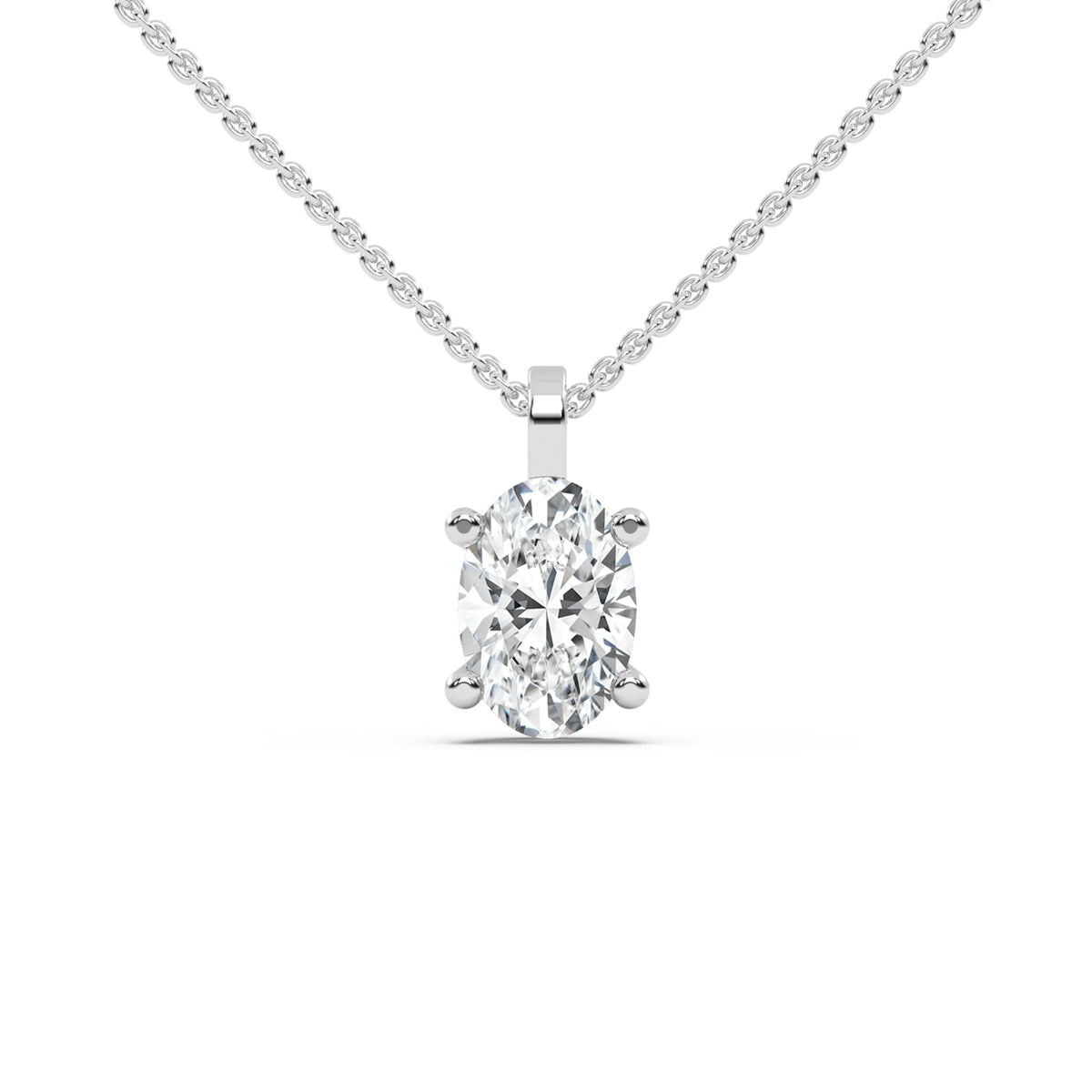 This white gold solitaire necklace featuring an oval diamond securely set in four prongs in top view