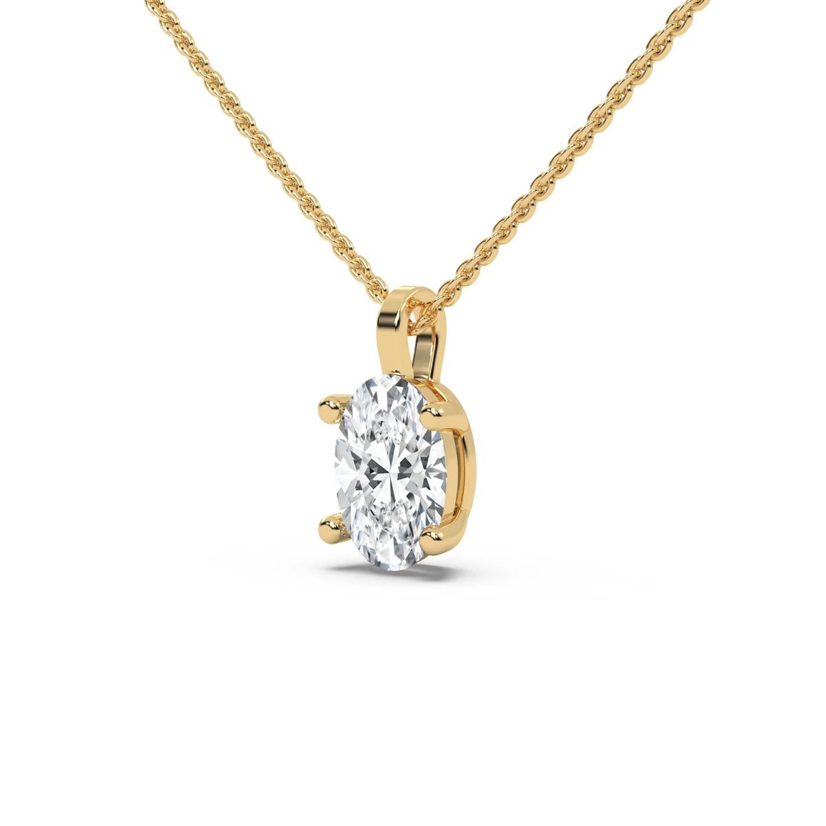 This yellow gold solitaire necklace featuring an oval diamond securely set in four prongs in side view