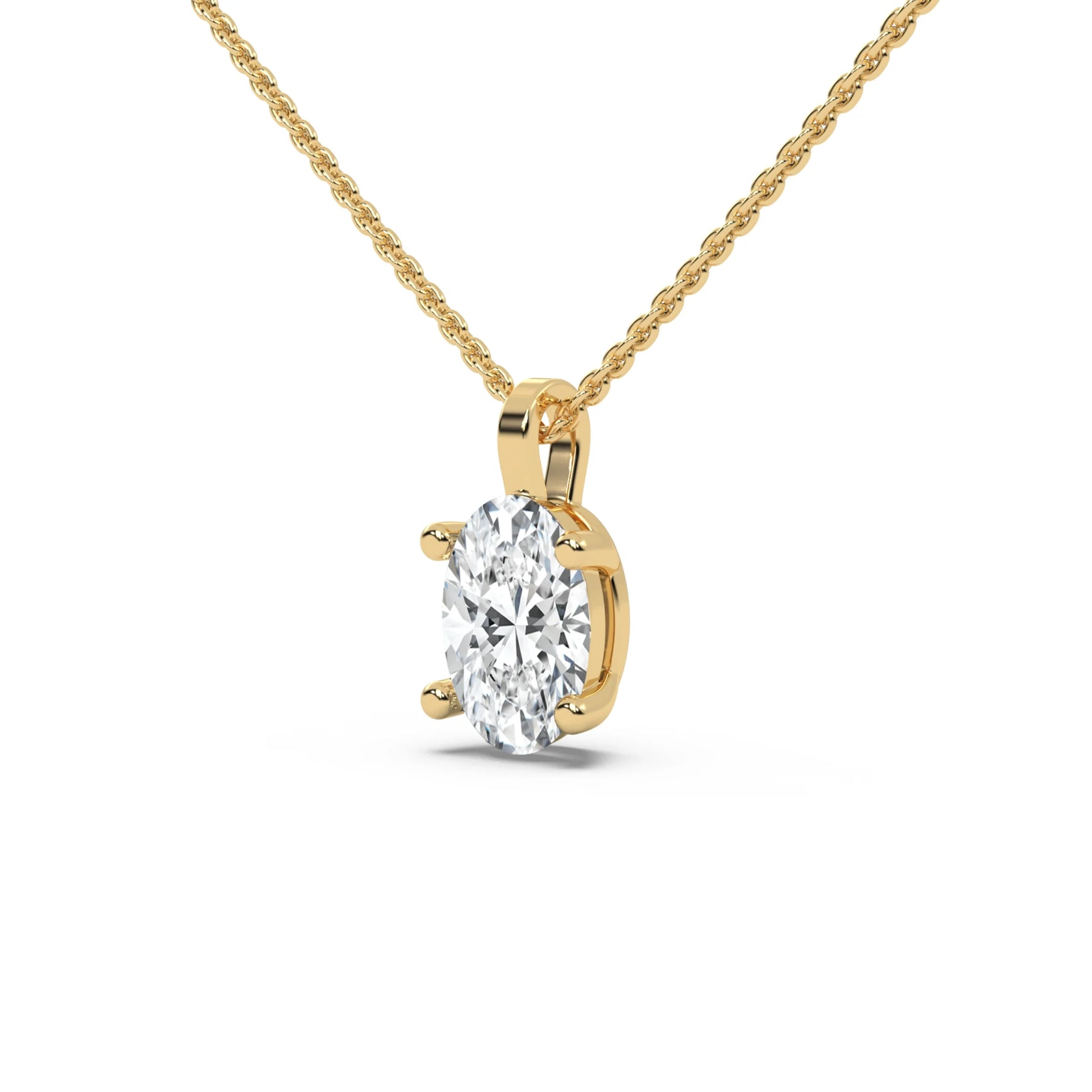 This yellow gold solitaire necklace featuring an oval diamond securely set in four prongs in side view