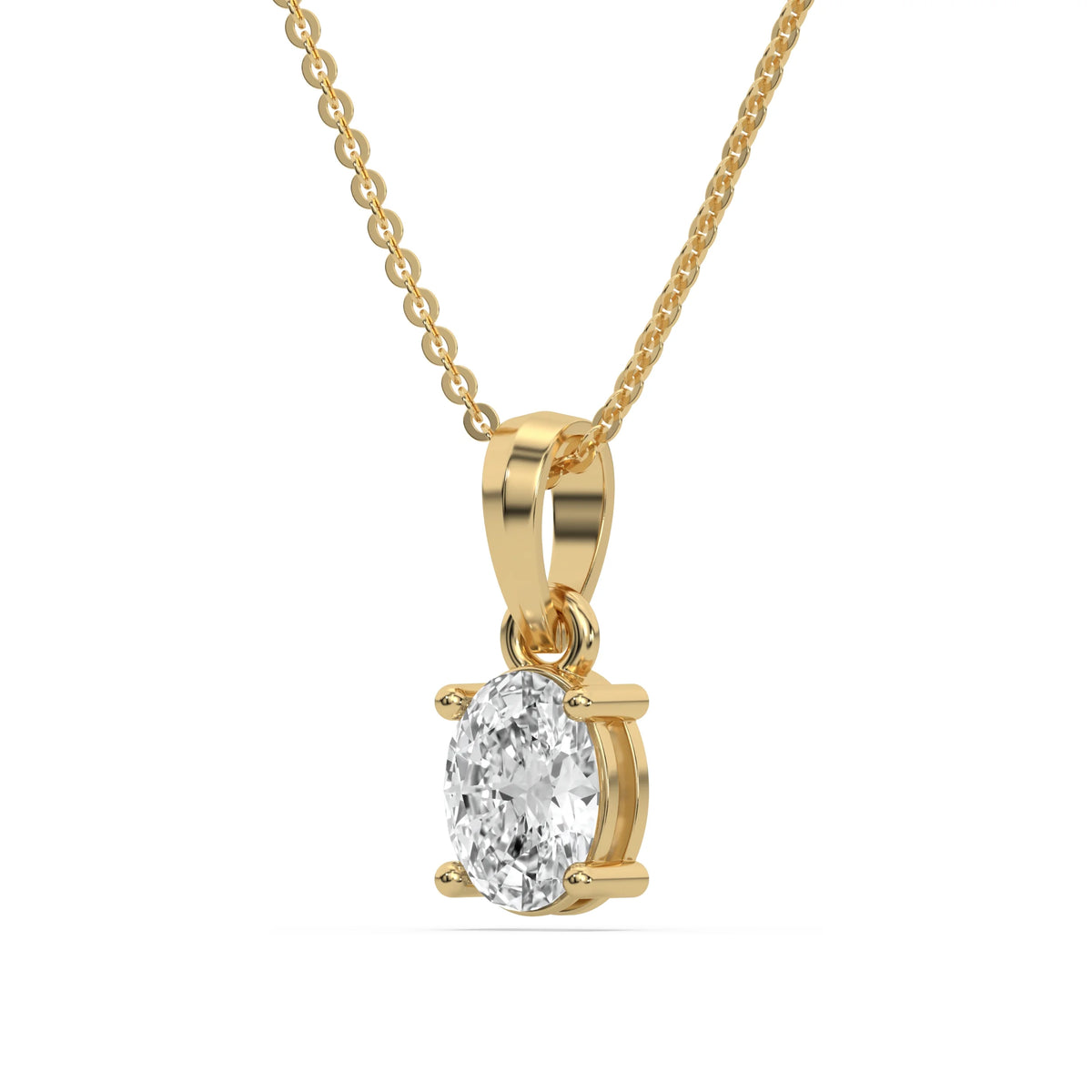 This yellow gold Oval Solitaire Diamond Necklace made with an oval cut diamond in a four prong setting with adjustable chain in side view