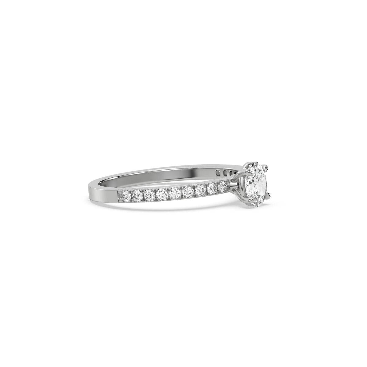 This white gold ring displayed in side view is made with a oval solitaire diamond set in four-prong setting