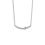 Curved Bar Diamond Necklace made with round brilliant-cut diamond in pave setting with a pear solitaire on top set at an angle with adjustable chain