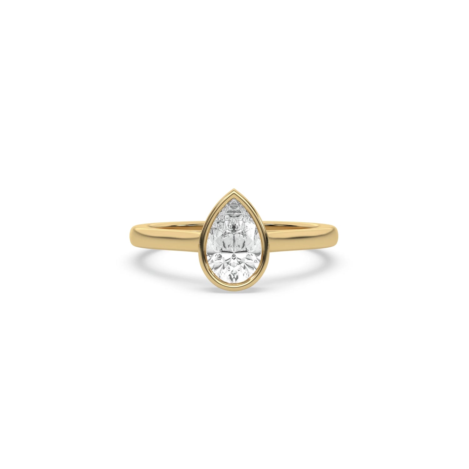 Minimalist yellow gold bezel solitaire pear diamond ring showcasing a teardrop pear-shaped center stone on a classic tapered gold band.