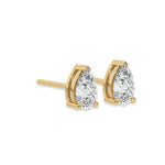 This yellow gold Classic Pear Diamond Earrings made with a pear-cut diamonds set in a four prong setting in side view