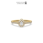 This yellow gold ring displayed in front view is made with a pear solitaire diamond set in four-prong setting