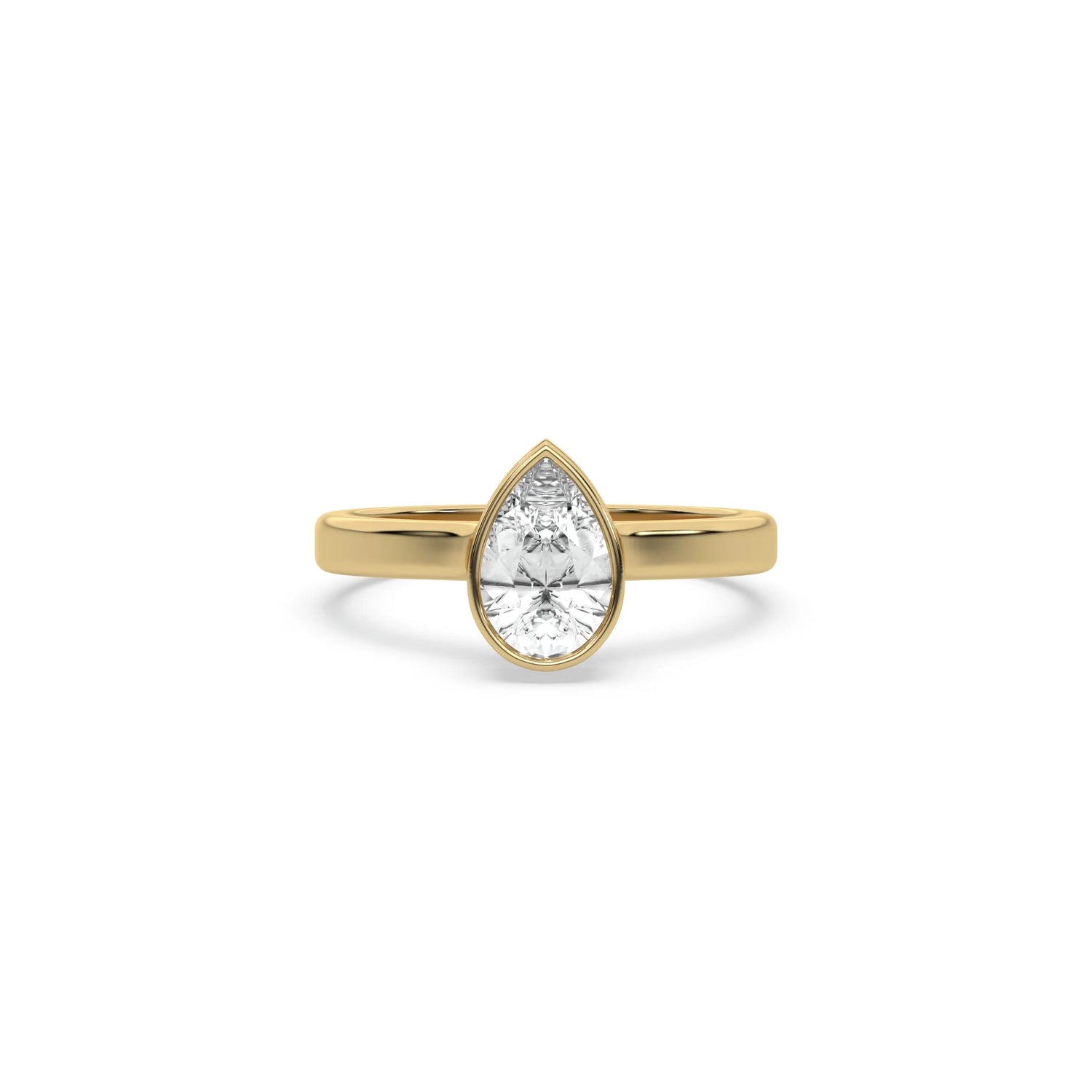 Pear cut diamond bezel set engagement ring with a modern yellow gold bezel setting on a plain band.