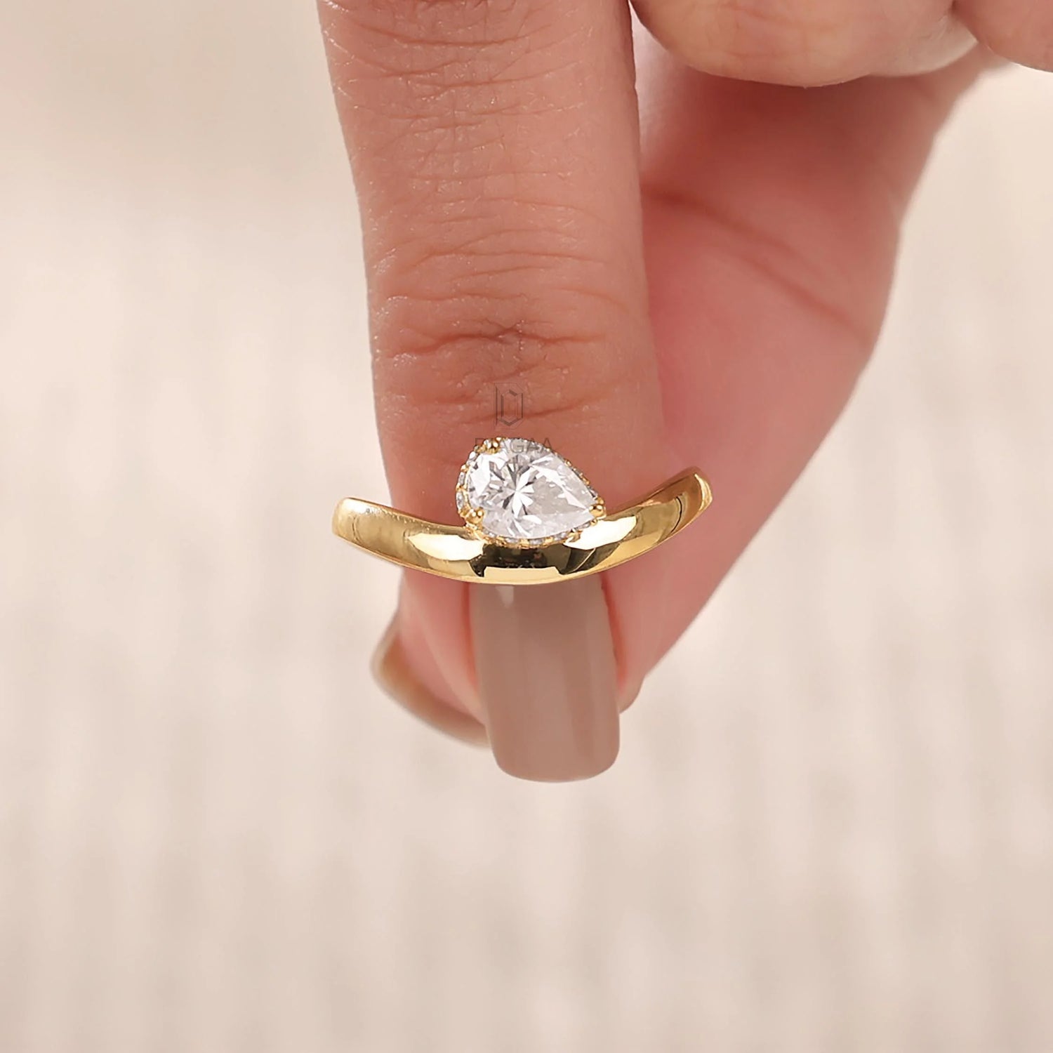 10K Yellow gold Pear diamond hidden halo engagement ring with curved band