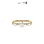 This yellow gold ring displayed in front view is made with a Pear solitaire diamond set in four-prong setting