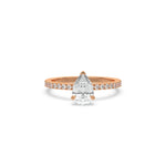 This rose gold ring displayed in front view is made with a Pear solitaire diamond set in four-prong setting